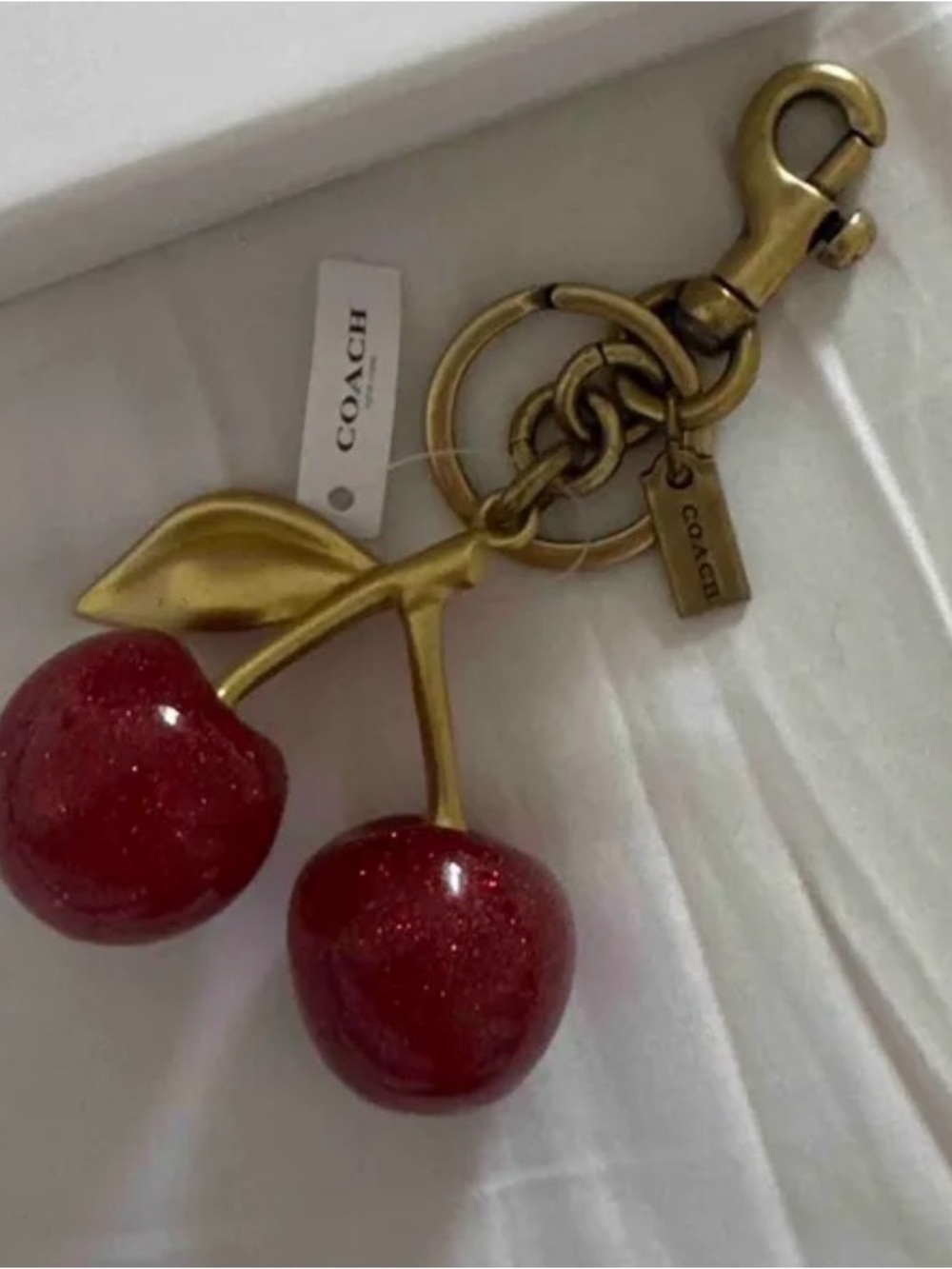 Coach Gold-Tone Cherry Keychain with Red Glitter Cherries